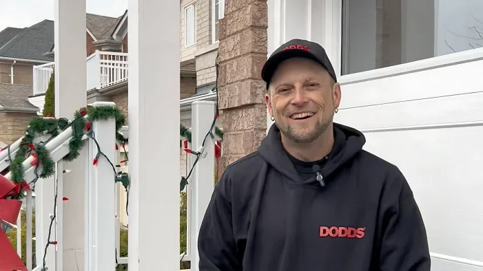 Friendly Dodds Garage Doors repair specialist providing residential and commercial service with a smile.