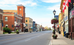 Street view of historic downtown Aurora near Aurora Town Square where Dodds provides garage door repairs.
