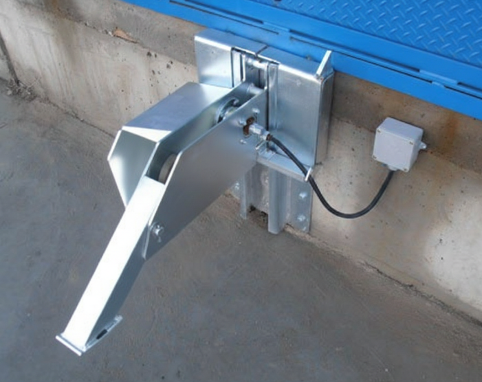 Automated vehicle restraints and dock locks to prevent trailer creep and ensure worker safety during loading operations in Southern Ontario.