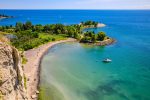 Scenic view of Bluffers Park beach and turquoise water in Scarborough, a key community landmark.