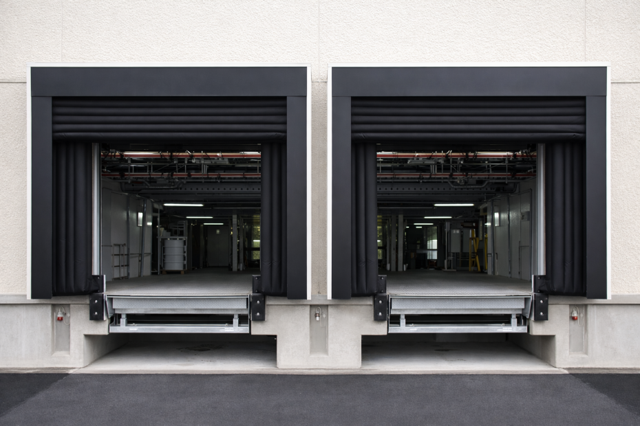 High-angle view of a professionally installed inflatable dock seal system by Dodds, providing a superior seal for various trailer sizes.