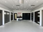 Complete interior showroom view showcasing the wide selection of residential garage doors available at Dodds in Whitby.