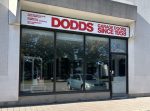 Dodds Garage Doors Burlington storefront featuring 24/7 emergency repair services and residential garage door sales since 1958.