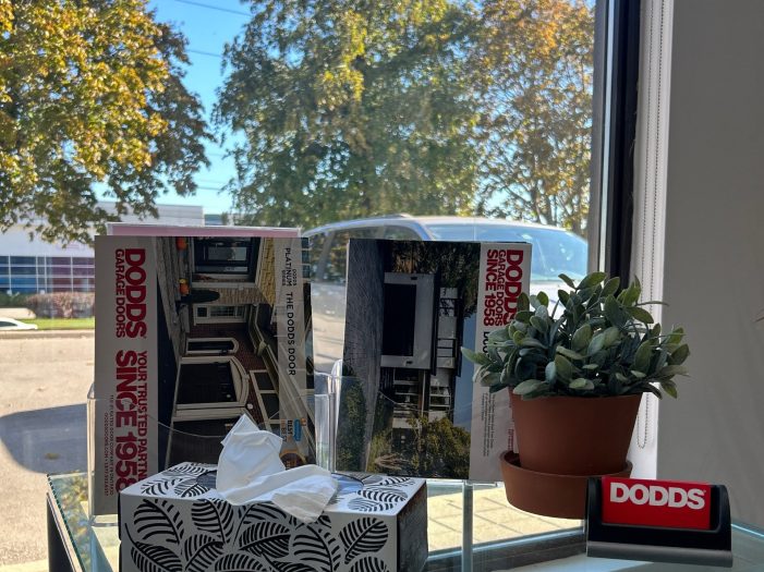 Interior of Dodds Garage Doors showroom in Scarborough featuring product brochures and customer service desk.