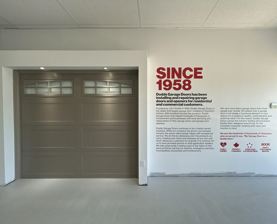 Contemporary horizontal plank garage door with minimalist stacked frosted glass window inserts.