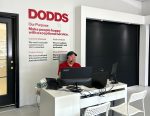 Rows of high-quality residential garage door styles and color choices inside the new Whitby showroom location.