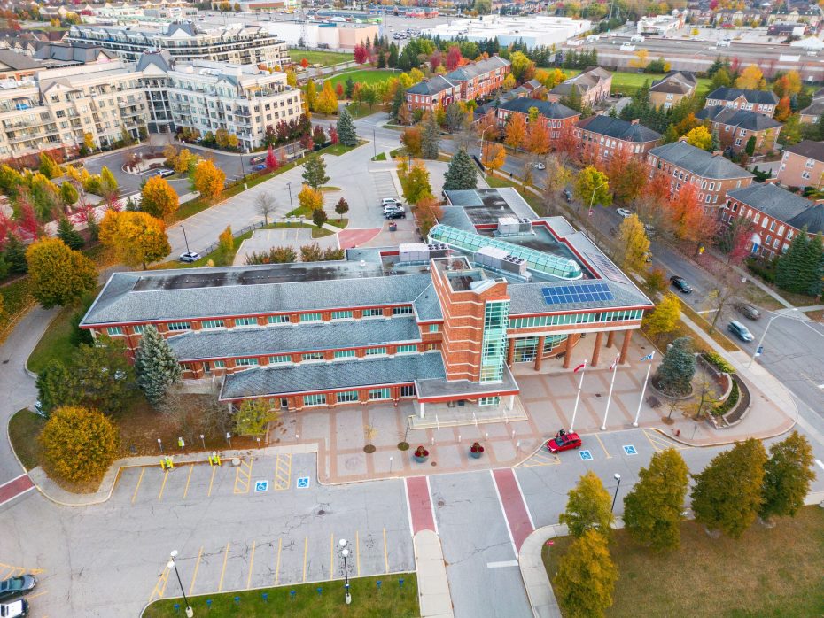 Aerial view of residential and commercial buildings in Aurora, Ontario, highlighting the Dodds Garage Doors service area.