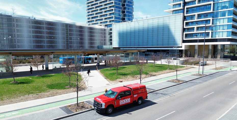 Dodds Garage Doors service truck parked near Transit City condos in Vaughan, providing residential garage door repairs.