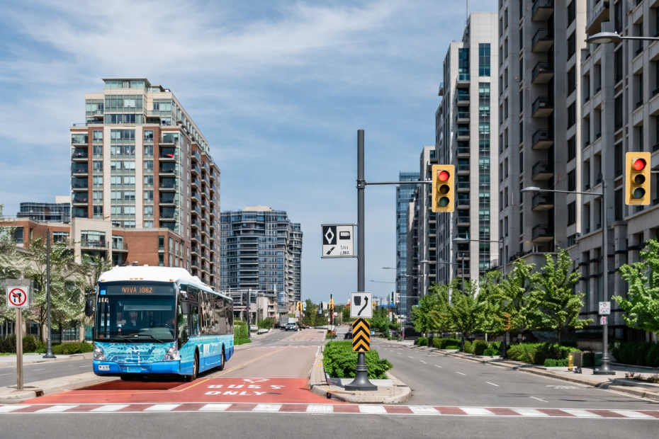 Urban street view in Richmond Hill featuring a Viva bus, representing Dodds Garage Doors' local community presence.