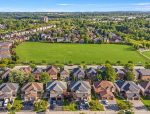 Aerial view of a suburban residential neighborhood in Georgetown Ontario near green space.