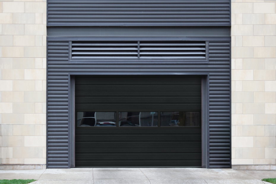 Heavy-duty sectional steel commercial door installed at an Ontario industrial facility for maximum security and durability.