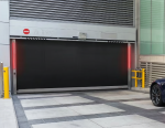 Durable high-speed rubber overhead door designed for industrial efficiency in Ontario warehouses and high-traffic condo parking garages to reduce air loss and improve climate control.