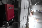 Close-up of a LiftMaster Maxum commercial jackshaft operator featuring a DC motor for quiet and efficient industrial operation.