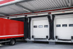 Multiple loading dock bays equipped with inflatable seals, helping a distribution center achieve maximum energy efficiency and pest control.