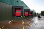 A series of loading dock seals installed across multiple shipping bays by Dodds Garage Doors to improve climate control in a large warehouse.