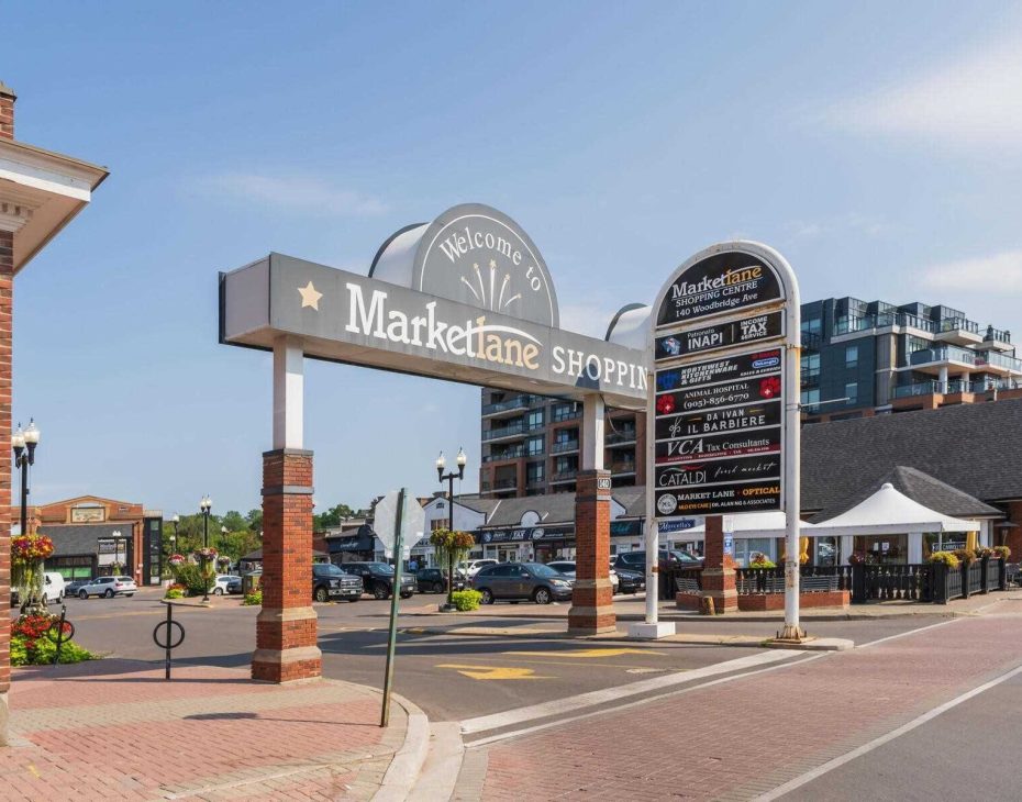 The iconic Market Lane Shopping Centre entrance sign on Woodbridge Ave, representing the heart of the Woodbridge community served by Dodds.