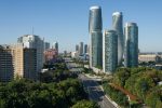 High-angle view of Mississauga city center skyline featuring Absolute World towers and Burnhamthorpe Road.