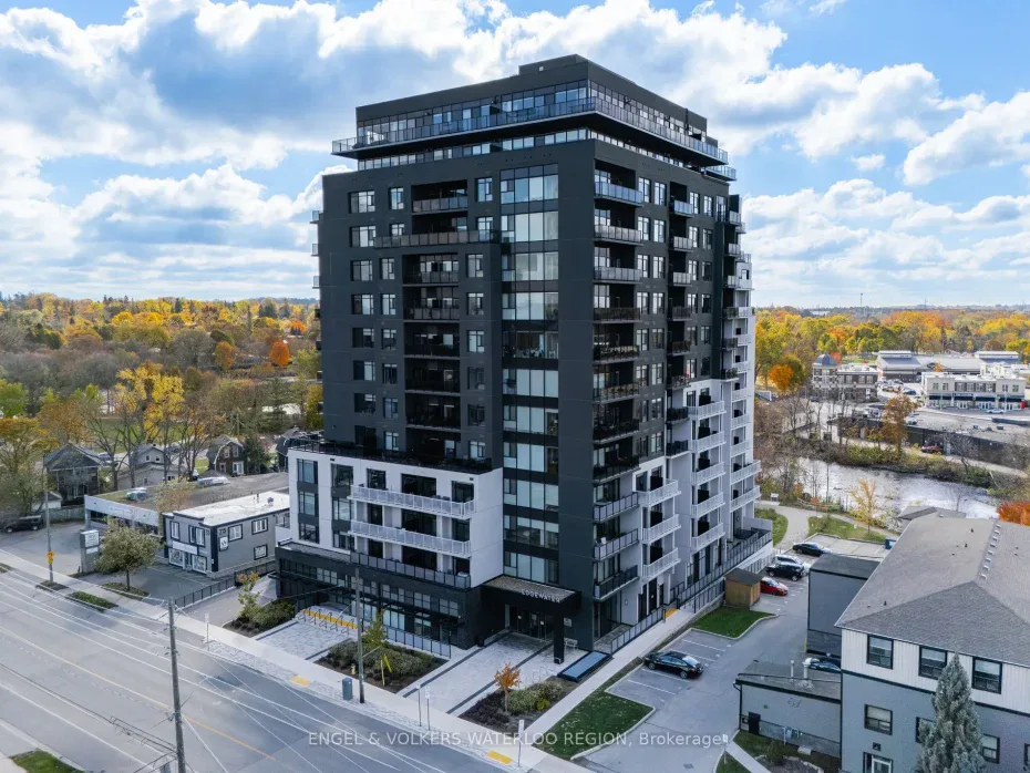 A modern multi-story residential condominium building in Georgetown, Ontario, showcasing contemporary urban architecture and glass balconies.