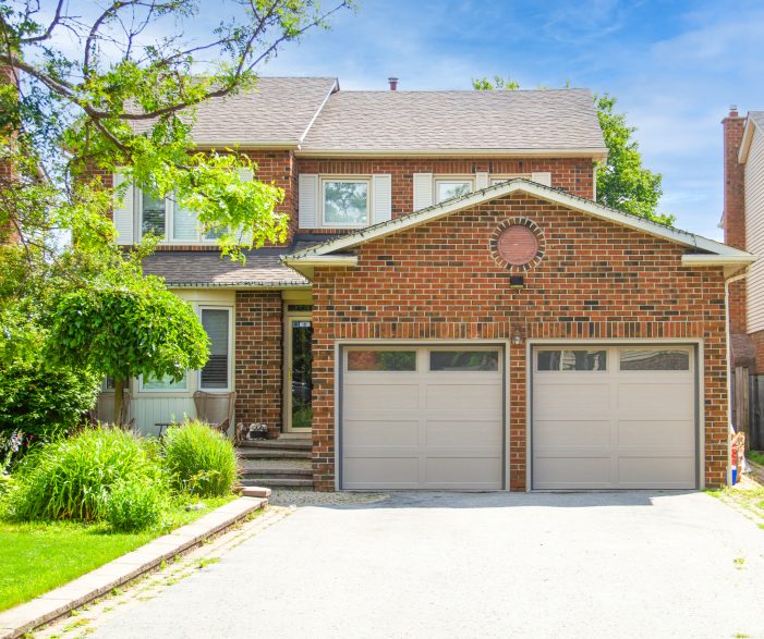 A beautiful Whitby home featuring professional double garage door installation by Dodds.