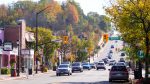 Street level view of Queen Street in Bolton Ontario featuring Caffe Contessa and local businesses.