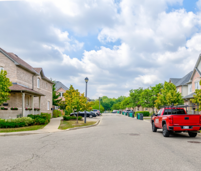 Dodds Garage Doors service truck parked in a residential Streetsville neighborhood.