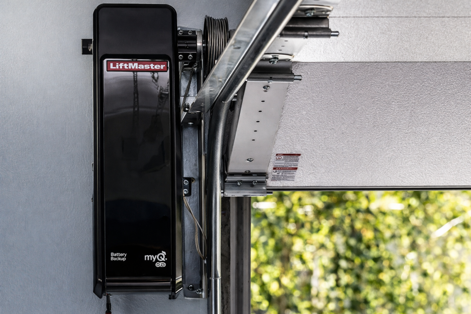 Residential LiftMaster side-mount wall opener installed in an Ontario garage to save overhead space and provide quiet, reliable operation.