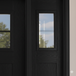 Detailed view of a black fiberglass door window insert showing the high-quality wood-look grain.