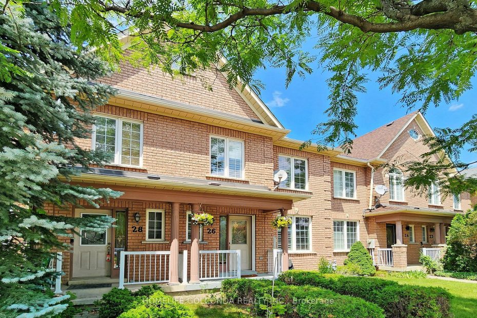 Professional garage door services for brick townhomes in the Concord neighborhood of Vaughan, Ontario.
