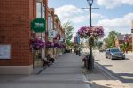 Street view of local businesses including Village Hair Studio in downtown Streetsville.
