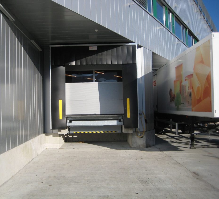 All-weather warehouse dock shelters designed to keep rain and snow out of loading bays, ensuring worker safety and dry loading conditions in the Greater Toronto Area.